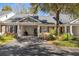 Charming home with a spacious carport, brick facade, and well-manicured landscaping at 489-3 Golden Bear Dr. # 3, Pawleys Island, SC 29585