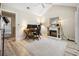 Home office with fireplace, wood floors, and ample natural light at 489-3 Golden Bear Dr. # 3, Pawleys Island, SC 29585