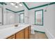 Clean bathroom with wood cabinets and a bathtub/shower combo at 502 Hay Hill Ln. # B, Myrtle Beach, SC 29579