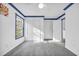 Bright bedroom featuring gray carpeting and double-door closet at 502 Hay Hill Ln. # B, Myrtle Beach, SC 29579