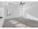 Bright bedroom with carpet, ceiling fan, and multiple windows at 502 Hay Hill Ln. # B, Myrtle Beach, SC 29579