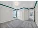 Cozy bedroom with grey carpet, double door closet and unique trim at 502 Hay Hill Ln. # B, Myrtle Beach, SC 29579