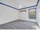 Cozy bedroom with gray carpeting and a ceiling fan at 502 Hay Hill Ln. # B, Myrtle Beach, SC 29579