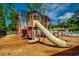 Community playground with a slide and climbing structures at 502 Hay Hill Ln. # B, Myrtle Beach, SC 29579