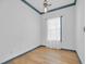 Bright spare bedroom with hardwood floors and white walls at 502 Hay Hill Ln. # B, Myrtle Beach, SC 29579