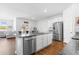 Modern kitchen with island and stainless steel appliances at 536 Meadowgrass Ct., Myrtle Beach, SC 29588