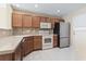 Kitchen with stainless steel appliances and wood cabinets at 537 Uniola Dr. # 537, Myrtle Beach, SC 29579