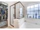 Bathroom features a shower tub combo and a large closet at 5508 Whistling Duck Dr., North Myrtle Beach, SC 29582