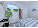 Bedroom with a TV, a bed, and a small sitting area at 5508 Whistling Duck Dr., North Myrtle Beach, SC 29582