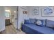 Bedroom with a daybed, a small closet, and an ensuite bathroom at 5508 Whistling Duck Dr., North Myrtle Beach, SC 29582