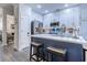 Modern kitchen with stainless steel appliances and a large island at 5508 Whistling Duck Dr., North Myrtle Beach, SC 29582