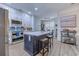 Updated kitchen featuring a large island, stainless steel appliances, and stylish cabinetry at 5508 Whistling Duck Dr., North Myrtle Beach, SC 29582