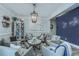 Cozy living area with seating around a coffee table, accent wall, and decorative accents at 5508 Whistling Duck Dr., North Myrtle Beach, SC 29582
