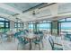 Indoor dining area with ocean view and folding doors at 5508 Whistling Duck Dr., North Myrtle Beach, SC 29582