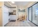 Small kitchen with white cabinets and appliances at 5905 South Kings Hwy. # 408, Myrtle Beach, SC 29575