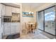 Small kitchen with white cabinets and appliances at 5905 South Kings Hwy. # 408, Myrtle Beach, SC 29575