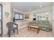 Living room with sofa, small table, and built-in bed at 5905 South Kings Hwy. # 408, Myrtle Beach, SC 29575