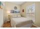 Bright bedroom with a queen-size bed and large window at 6001 - 1243 S Kings Hwy., Myrtle Beach, SC 29575