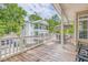 Spacious deck with outdoor seating, overlooking neighboring houses and lush greenery at 6001 - 1243 S Kings Hwy., Myrtle Beach, SC 29575