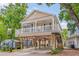 Two-story elevated beach house with wrap-around deck at 6001 - 1243 S Kings Hwy., Myrtle Beach, SC 29575