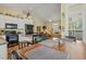 Modern kitchen with black appliances and an island at 6001 - 1243 S Kings Hwy., Myrtle Beach, SC 29575