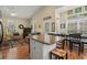Open floor plan combines kitchen and living room with hardwood floors at 6001 - 1243 S Kings Hwy., Myrtle Beach, SC 29575