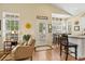 Bright living area with access to a deck and hardwood floors at 6001 - 1243 S Kings Hwy., Myrtle Beach, SC 29575