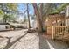Large backyard with mature trees, picnic table, and storage shed at 6001-Mh53 S Kings Highway, Myrtle Beach, SC 29575