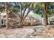 Spacious backyard with large tree and picnic table at 6001-Mh53 S Kings Highway, Myrtle Beach, SC 29575