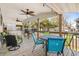 Deck with table and chairs, ceiling fans, and comfortable seating at 6001-Mh53 S Kings Highway, Myrtle Beach, SC 29575