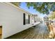 Side view of home with deck and landscaping at 6001-Mh53 S Kings Highway, Myrtle Beach, SC 29575