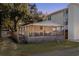 Single-story home with large deck, nighttime view at 6001-Mh53 S Kings Highway, Myrtle Beach, SC 29575