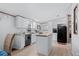 Updated kitchen featuring white cabinets and a kitchen island at 6001-Mh53 S Kings Highway, Myrtle Beach, SC 29575