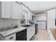 Modern kitchen with white cabinets and stainless steel appliances at 6001-Mh53 S Kings Highway, Myrtle Beach, SC 29575