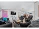 Living room with TV, comfy seating, and pink door at 6001-Mh53 S Kings Highway, Myrtle Beach, SC 29575
