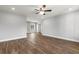 Spacious living room featuring hardwood floors and a ceiling fan at 621 Bay St., Aynor, SC 29511