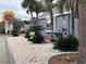 Landscaped grounds with signage for St. John's Inn at 6803 N Ocean Blvd. # 115, Myrtle Beach, SC 29572