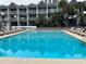 Clean, refreshing pool with plenty of lounge chairs at 6803 N Ocean Blvd. # 115, Myrtle Beach, SC 29572