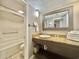 Well-maintained bathroom featuring a vanity with granite countertop and a shower at 6900 N Ocean Blvd. # 1234, Myrtle Beach, SC 29577