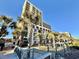 Beautiful exterior shot of a resort, showcasing palm trees and ocean views at 6900 N Ocean Blvd. # 1234, Myrtle Beach, SC 29577