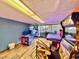 Entertainment room with hardwood floors and various arcade games for hours of fun at 6900 N Ocean Blvd. # 1234, Myrtle Beach, SC 29577