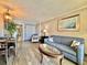 Inviting living room with a dining table, sofa, accent chair, and stylish decor at 6900 N Ocean Blvd. # 1234, Myrtle Beach, SC 29577