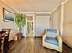 Spacious room view of the dining table, living area, and entrance featuring an accent chair at 6900 N Ocean Blvd. # 1234, Myrtle Beach, SC 29577