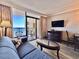 Relaxing living room view with ocean view balcony access and comfortable seating at 6900 N Ocean Blvd. # 1234, Myrtle Beach, SC 29577