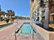 Outdoor pools, featuring a hot tub, main pool, kid splash area, and a towering condominium complex at 6900 N Ocean Blvd. # 1234, Myrtle Beach, SC 29577