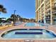 Multi-level pools with a jacuzzi, a ' splash pad, and an in-ground pool at this Gathering friendly resort at 6900 N Ocean Blvd. # 1234, Myrtle Beach, SC 29577