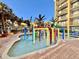 Resort water park with colorful play structures, creating a fun-filled environment for families and children at 6900 N Ocean Blvd. # 1234, Myrtle Beach, SC 29577
