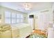 Bedroom with white shutters, a ceiling fan, and white dresser at 737 Walnut Ave., Myrtle Beach, SC 29577