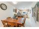 Dining area with wooden table and chairs, kitchen view at 775 Plantation Dr. # 48, Little River, SC 29566