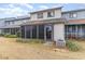 Back exterior view with screened porch at 775 Plantation Dr. # 48, Little River, SC 29566